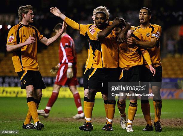 Sylvain Ebanks-Blake of Wolverhampton Wanderers is congratulated on his goal during the Coca-Cola Championship match between Wolverhampton Wanderers...