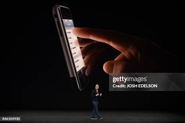 Apple CEO Tim Cook speaks about the new iPhone 8 during a media event at Apple's new headquarters in Cupertino, California on September 12, 2017.