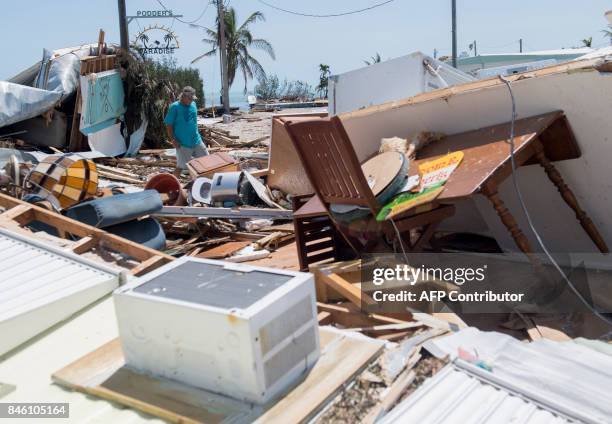 Debris from trailer homes destroyed by Hurricane Irma litters the Seabreeze Trailer Park in Islamorada, in the Florida Keys, September 12, 2017. /...