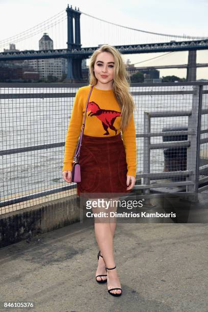 Singer Sabrina Carpenter attends Coach Spring 2018 fashion show during New York Fashion Week at Basketball City - Pier 36 - South Street on September...