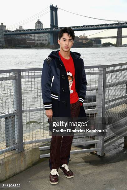 Actor Timmy Xu attends Coach Spring 2018 fashion show during New York Fashion Week at Basketball City - Pier 36 - South Street on September 12, 2017...