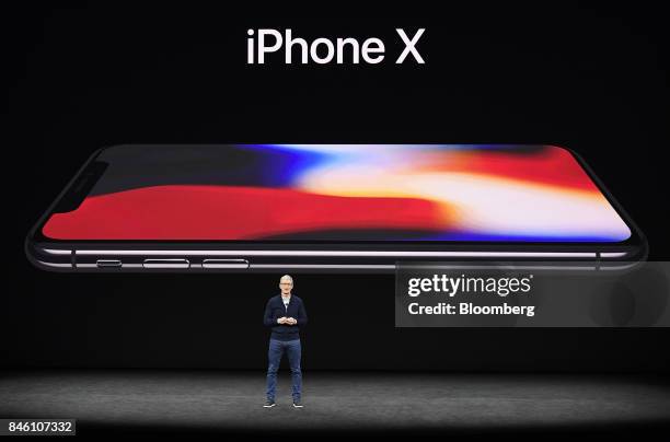 Tim Cook, chief executive officer of Apple Inc., speaks about the iPhone X during an event at the Steve Jobs Theater in Cupertino, California, U.S.,...