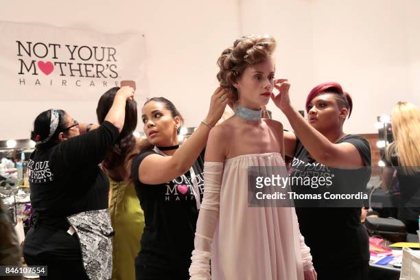 Models prepare backstage at Kia STYLE360 Hosts Helen Castillo New York S/S '18 Presented by ChapStick at Metropolitan West on September 12, 2017 in...