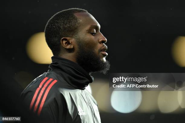 Manchester United's Belgian striker Romelu Lukaku warms up ahead of the UEFA Champions League Group A football match between Manchester United and...