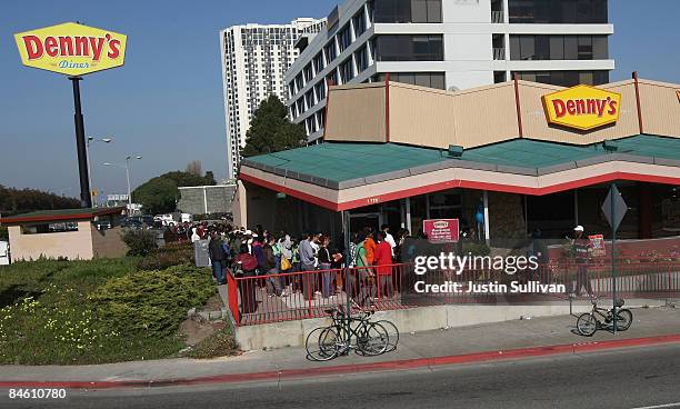 Denny's customers wait in line to get a free breakfast February 3, 2009 in Emeryville, California. People lined up at Denny's across North America...