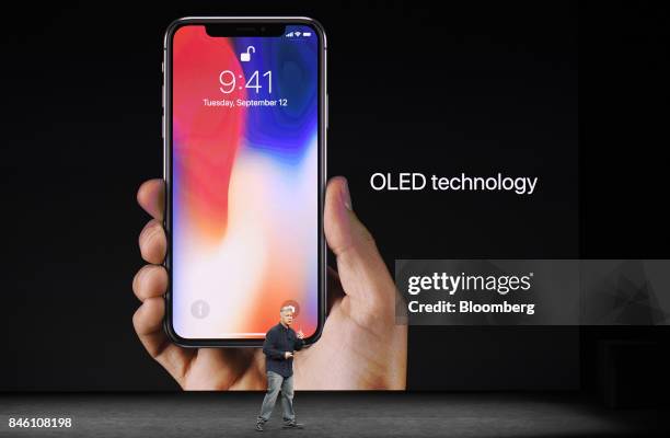 Phil Schiller, senior vice president of worldwide marketing at Apple Inc., speaks about the iPhone X during an event at the Steve Jobs Theater in...