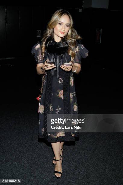 Actress Cinta Laura Kiehl poses backstage at Coach Spring 2018 fashion show during New York Fashion Week at Basketball City - Pier 36 - South Street...