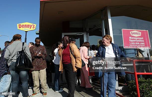 Denny's customers wait in line to get a free breakfast February 3, 2009 in Emeryville, California. People lined up at Denny's across North America...