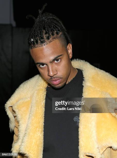 Rapper Vic Mensa poses backstage for Coach Spring 2018 fashion show during New York Fashion Week at Basketball City - Pier 36 - South Street on...