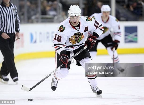 Patrick Sharp of the Chicago Blackhawks skates up ice with the puck during the game against the Los Angeles Kings at the Staples Center on January...