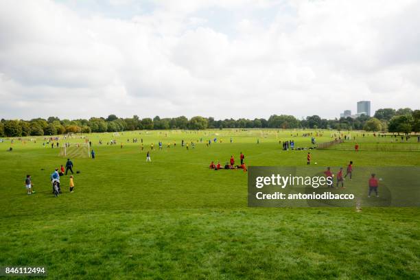 football teams training in regent's park - regents-park stock pictures, royalty-free photos & images
