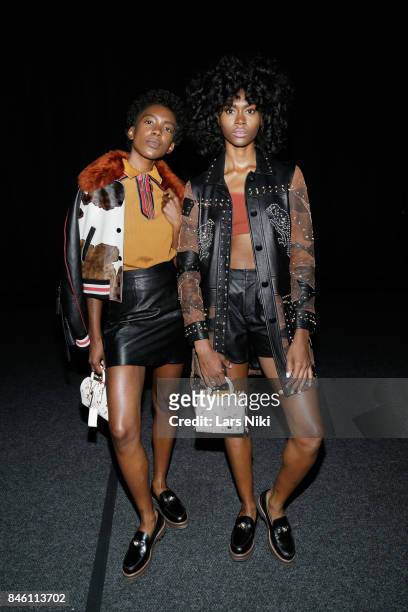 Musicians Alexe Belle and Isis Valentino of St. Beauty pose backstage during Coach Spring 2018 Fashion Show during New York Fashion Week at...