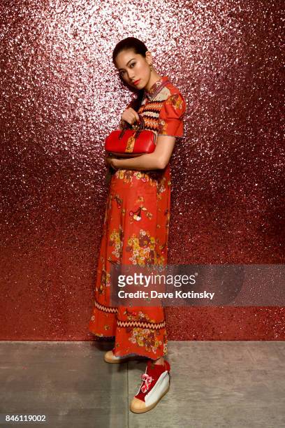 Actress Hikari Mori poses for a portrait during Coach Spring 2018 Fashion Show during New York Fashion Week at Basketball City - Pier 36 - South...
