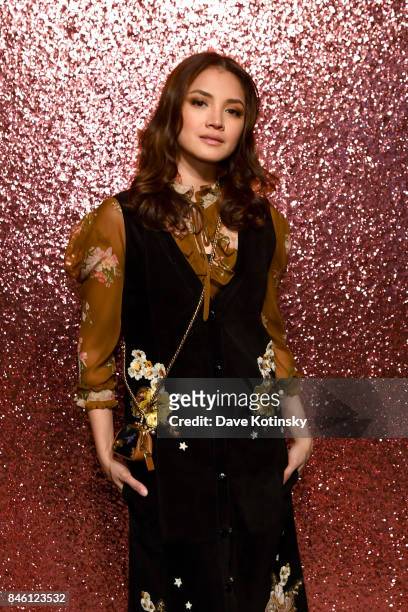 Fazura poses for a portrait during Coach Spring 2018 Fashion Show during New York Fashion Week at Basketball City - Pier 36 - South Street on...