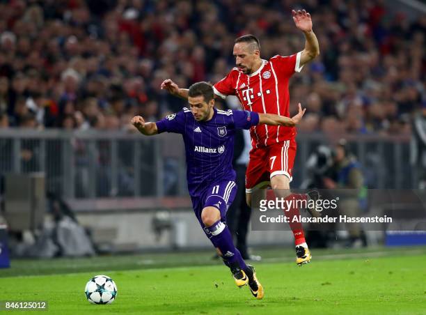 Franck Ribery of Muenchen and Alexandru Chipciu of Anderlecht battle for the ball during the UEFA Champions League group B match between Bayern...