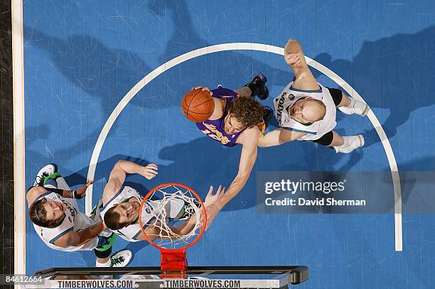 Pau Gasol of the Los Angeles Lakers puts up a shot against Kevin Love of the Minnesota Timberwolves during the game on January 30, 2009 at the Target...