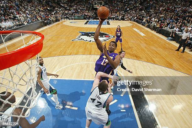 Andrew Bynum of the Los Angeles Lakers puts up a shot over Kevin Love of the Minnesota Timberwolves during the game on January 30, 2009 at the Target...