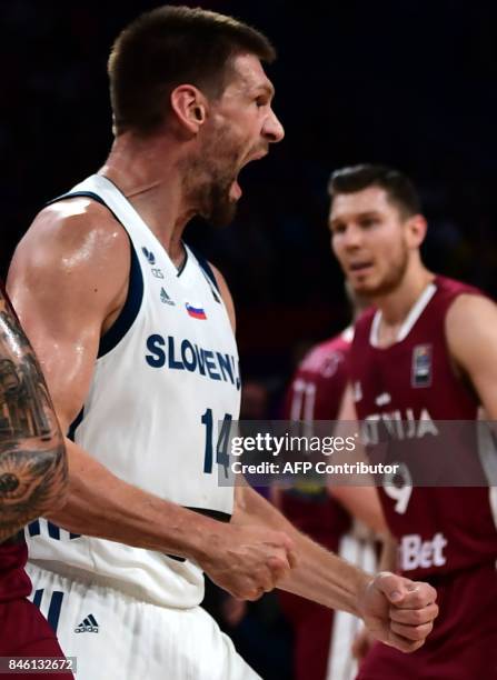 Slovenia`s centre Gasper Vidmar reacts after scoring a basket during FIBA Eurobasket 2017 men`s quarter-final basketball match between Slovenia and...