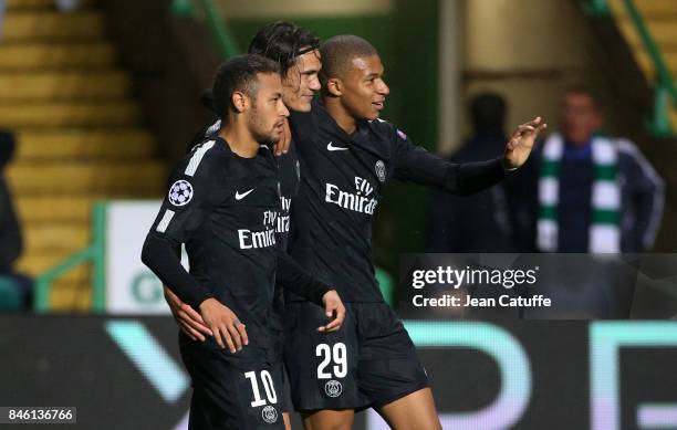 Neymar Jr of PSG celebrates his goal with Edinson Cavani and Kylian Mbappe during the UEFA Champions League match between Celtic Glasgow and Paris...