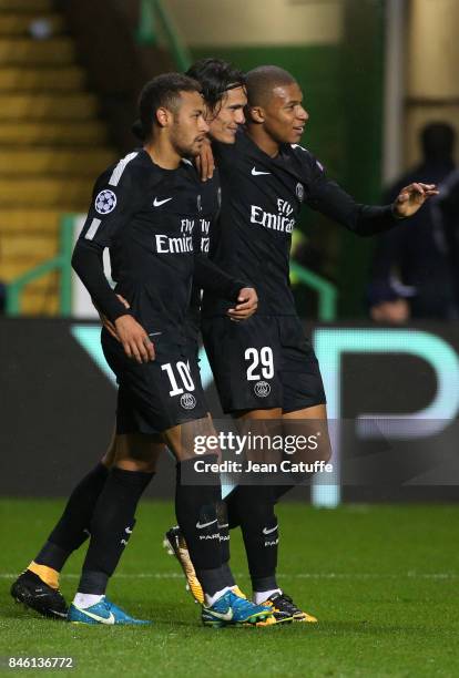 Neymar Jr of PSG celebrates his goal with Edinson Cavani and Kylian Mbappe during the UEFA Champions League match between Celtic Glasgow and Paris...