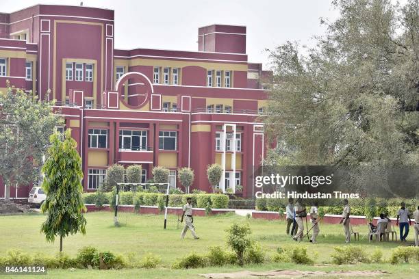 Security personnel at Ryan International School, on September 12, 2017 in Gurgaon, India. Seven year old student Pradhyumn Thakur was found dead with...