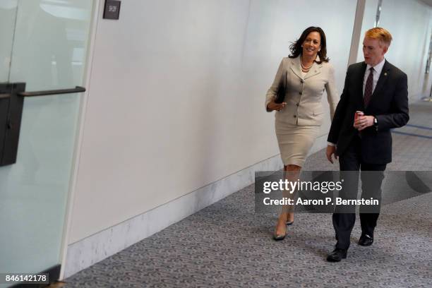 Sens. Kamala Harris and James Lankford enter a meeting of the Senate Intelligence Committee on Capitol Hill September 7, 2017 in Washington, DC. The...