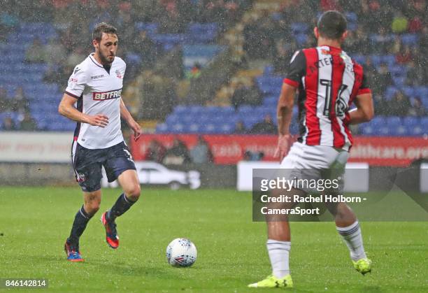 Sheffield United's Cameron Carter-Vickers and Bolton Wanderers' Will Buckley during the Sky Bet Championship match between Bolton Wanderers and...