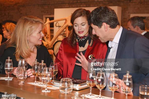 Erin Morris, Jasmine Guinness and Dr Bill Lumsden, Glenmorangie Director of Distilling & Whisky Creation, attend the launch of the 'Beyond The Cask'...