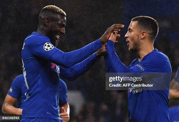 Chelsea's French midfielder Tiemoue Bakayoko celebrates scoring his team's fourth goal with Chelsea's Belgian midfielder Eden Hazard during the UEFA...