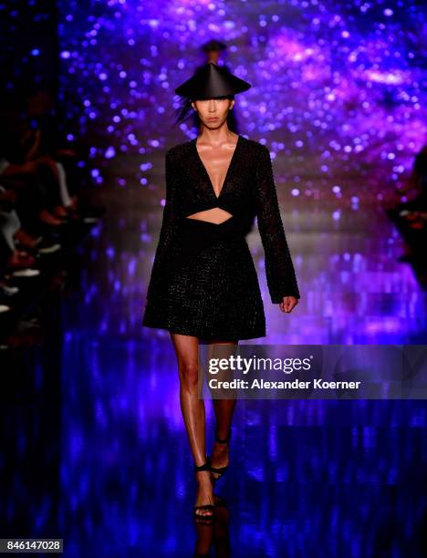 Model walks the runway at the Ozgur Masur show during Mercedes-Benz Istanbul Fashion Week September 2017 at Zorlu Center on September 12, 2017 in...