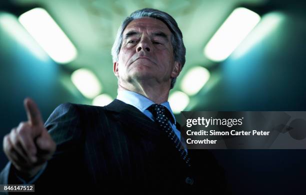 mature businessman pointing,  close-up, low angle view. - tax evasion stock pictures, royalty-free photos & images