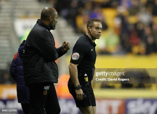 Nuno Espirito Santo, the Wolverhampton Wanderers head coach argues with the referee Steve Martin during the Sky Bet Championship match between...