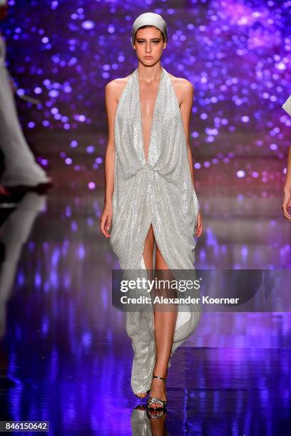 Model walks the runway at the Ozgur Masur show during Mercedes-Benz Istanbul Fashion Week September 2017 at Zorlu Center on September 12, 2017 in...
