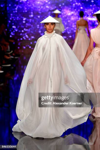 Model walks the runway at the Ozgur Masur show during Mercedes-Benz Istanbul Fashion Week September 2017 at Zorlu Center on September 12, 2017 in...