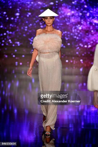 Model walks the runway at the Ozgur Masur show during Mercedes-Benz Istanbul Fashion Week September 2017 at Zorlu Center on September 12, 2017 in...