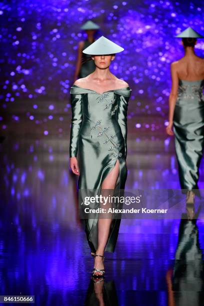 Model walks the runway at the Ozgur Masur show during Mercedes-Benz Istanbul Fashion Week September 2017 at Zorlu Center on September 12, 2017 in...