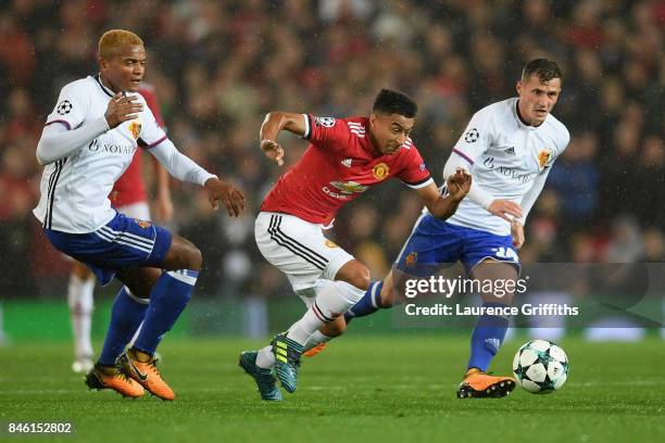 Manuel Akanji of FC Basel fouls Jesse Lingard of Manchester United during the UEFA Champions League Group A match between Manchester United and FC...