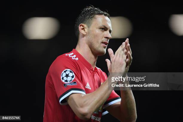 Nemanja Matic of Manchester United shows appreciation to the fans after the UEFA Champions League Group A match between Manchester United and FC...