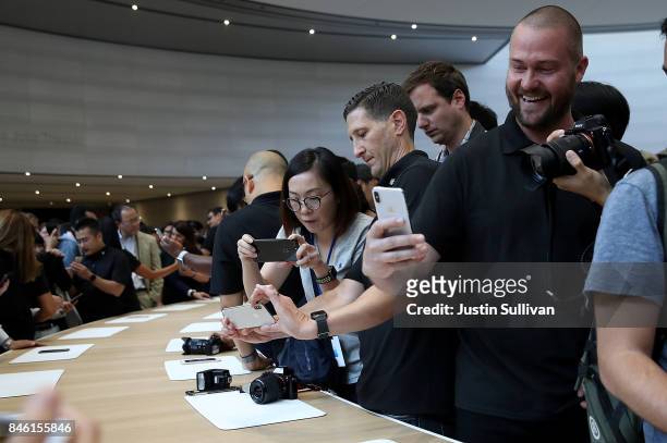 An attendee looks at a new iPhone X during an Apple special event at the Steve Jobs Theatre on the Apple Park campus on September 12, 2017 in...