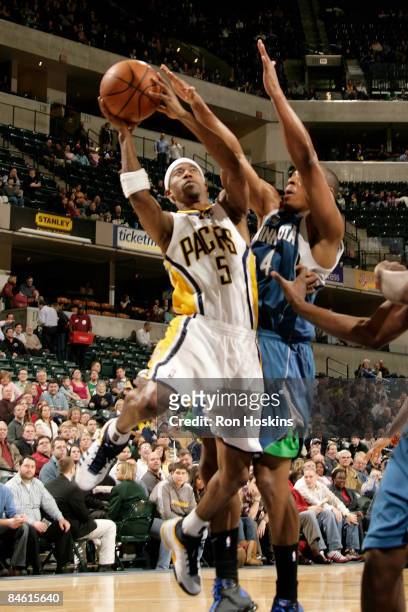 Ford of the Indiana Pacers shoots over Randy Foye of the Minnesota Timberwolves at Conseco Fieldhouse February 3, 2009 in Indianapolis, Indiana. NOTE...