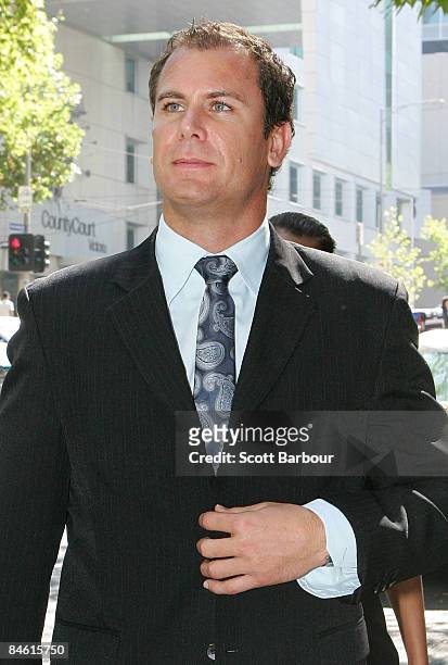Former AFL star Wayne Carey leaves court after facing three counts of assaulting police and of resisting arrest after an alleged argument at his Port...