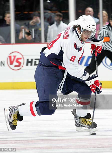 Alex Ovechkin of the Washington Capitals controls the puck against the New Jersey Devils at the Prudential Center on February 3, 2009 in Newark, New...
