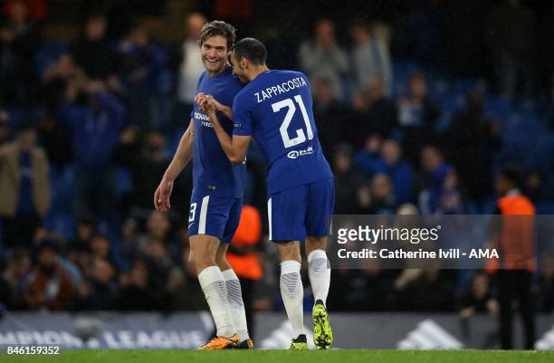 Marcos Alonso of Chelsea congratulates Davide Zappacosta of Chelsea after the UEFA Champions League group C match between Chelsea FC and Qarabag FK...