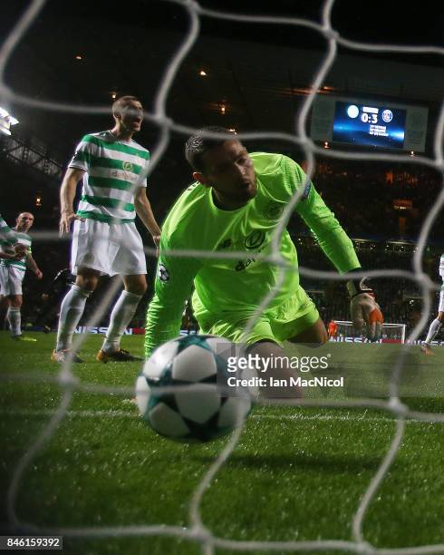 Craig Gordon of Celtic looks on as Mikael Lustig scores an own goal during the UEFA Champions League Group B match Between Celtic and Paris...