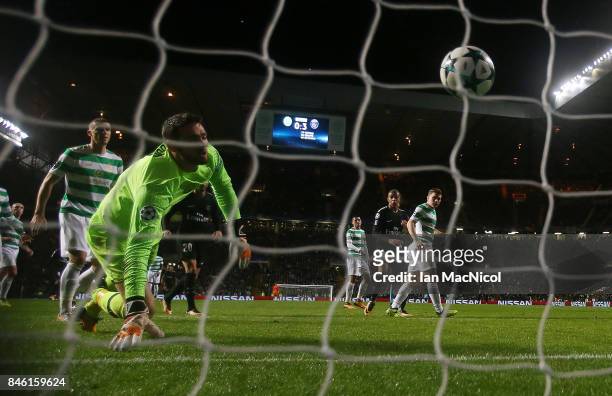 Craig Gordon of Celtic looks on as Mikael Lustig scores an own goal during the UEFA Champions League Group B match Between Celtic and Paris...