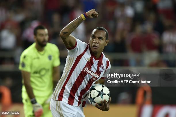 Olympiacos' Colombian midfielder Felipe Pardo celebrates his first goal during the Group D UEFA Champions League football match between Olympiacos...