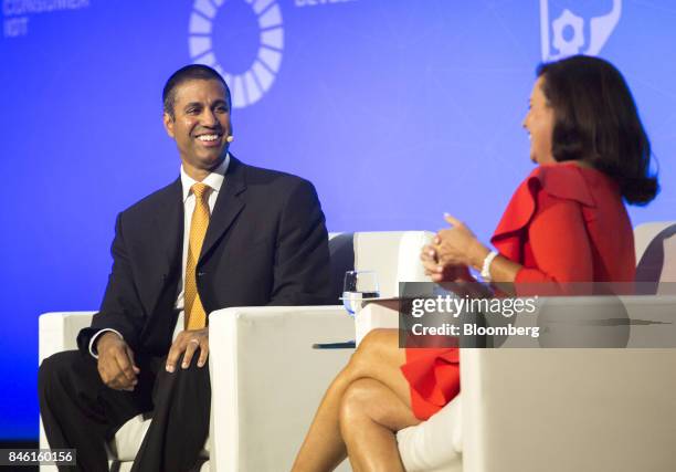 Ajit Pai, chairman of the Federal Communications Commission , and Meredith Attwell Baker, chief executive officer of Cellular Telecommunications...