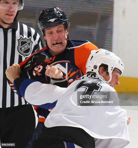 Vincent Lecavalier of the Tampa Bay Lightning fights with Tim Jackman of the New York Islanders at the Nassau Coliseum February 3, 2009 in Uniondale,...