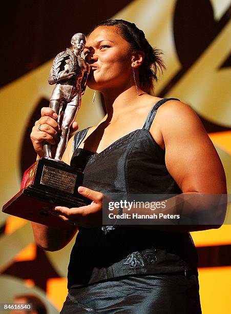 New Zealand Shot Put champion Valerie Vili holds up the Supreme Halberg Award during the Halberg Sports Awards held at the Vector Arena on February...