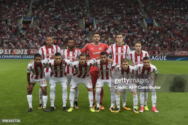 Olympiacos players Olympiacos' Moroccan midfielder Mehdi Carcela-Gonzalez, Olympiacos' Serbian forward Uros Djurdjevic, Olympiacos' Belgian defender...